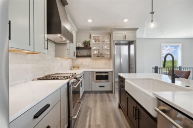 This Hodge Construction built home overlooks the scenic on Saddleback Ridge Golf Course in Iowa - for sale on GolfHomes.com, golf home, golf lot