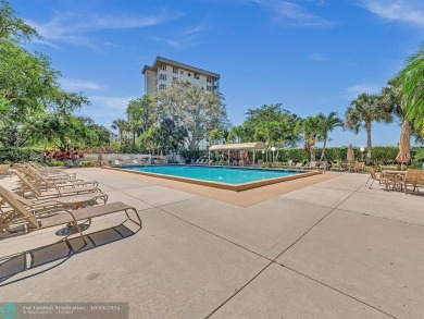 Stunningly renovated 8th floor *F* unit in coveted Building 114 on Palm-Aire Country Club and Resort - Palms in Florida - for sale on GolfHomes.com, golf home, golf lot