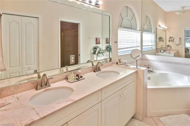 AMAZING LOCATION! The expansive Dover Flex Model Villa, located on Cedar Hammock Golf and Country Club in Florida - for sale on GolfHomes.com, golf home, golf lot