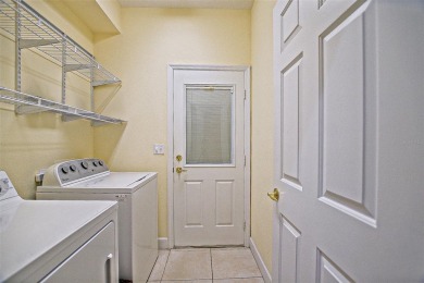 Lovely Kingston Patio home on corner lot with views to the Golf on Eagle Ridge At Spruce Creek Country Club in Florida - for sale on GolfHomes.com, golf home, golf lot