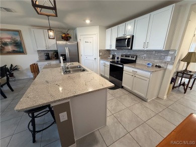This almost new (built in 2022), beautifully designed 4-bedroom on Twisted Oaks Golf Club in Florida - for sale on GolfHomes.com, golf home, golf lot