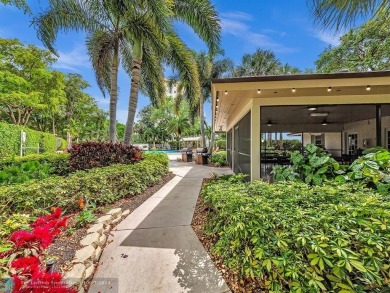 Stunningly renovated 8th floor *F* unit in coveted Building 114 on Palm-Aire Country Club and Resort - Palms in Florida - for sale on GolfHomes.com, golf home, golf lot