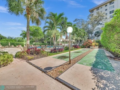 Stunningly renovated 8th floor *F* unit in coveted Building 114 on Palm-Aire Country Club and Resort - Palms in Florida - for sale on GolfHomes.com, golf home, golf lot