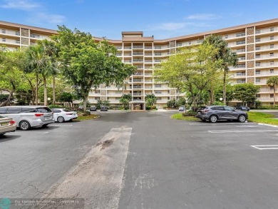 Stunningly renovated 8th floor *F* unit in coveted Building 114 on Palm-Aire Country Club and Resort - Palms in Florida - for sale on GolfHomes.com, golf home, golf lot