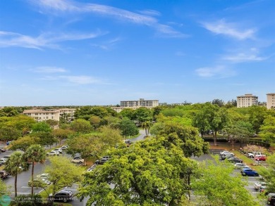 Stunningly renovated 8th floor *F* unit in coveted Building 114 on Palm-Aire Country Club and Resort - Palms in Florida - for sale on GolfHomes.com, golf home, golf lot