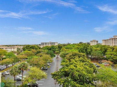 Stunningly renovated 8th floor *F* unit in coveted Building 114 on Palm-Aire Country Club and Resort - Palms in Florida - for sale on GolfHomes.com, golf home, golf lot