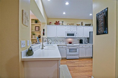 Lovely Kingston Patio home on corner lot with views to the Golf on Eagle Ridge At Spruce Creek Country Club in Florida - for sale on GolfHomes.com, golf home, golf lot