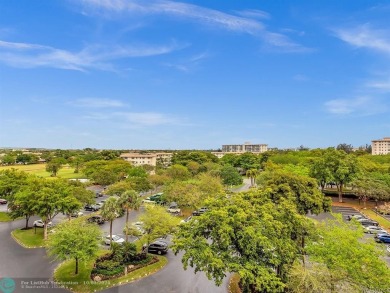 Stunningly renovated 8th floor *F* unit in coveted Building 114 on Palm-Aire Country Club and Resort - Palms in Florida - for sale on GolfHomes.com, golf home, golf lot