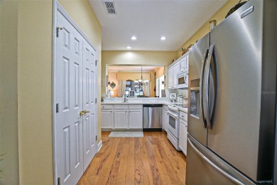 Lovely Kingston Patio home on corner lot with views to the Golf on Eagle Ridge At Spruce Creek Country Club in Florida - for sale on GolfHomes.com, golf home, golf lot