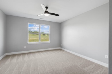 This Hodge Construction built home overlooks the scenic on Saddleback Ridge Golf Course in Iowa - for sale on GolfHomes.com, golf home, golf lot