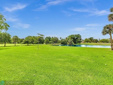 Stunningly renovated 8th floor *F* unit in coveted Building 114 on Palm-Aire Country Club and Resort - Palms in Florida - for sale on GolfHomes.com, golf home, golf lot