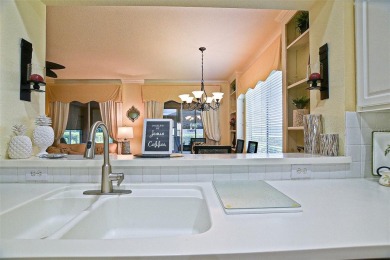 Lovely Kingston Patio home on corner lot with views to the Golf on Eagle Ridge At Spruce Creek Country Club in Florida - for sale on GolfHomes.com, golf home, golf lot