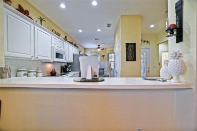 Lovely Kingston Patio home on corner lot with views to the Golf on Eagle Ridge At Spruce Creek Country Club in Florida - for sale on GolfHomes.com, golf home, golf lot
