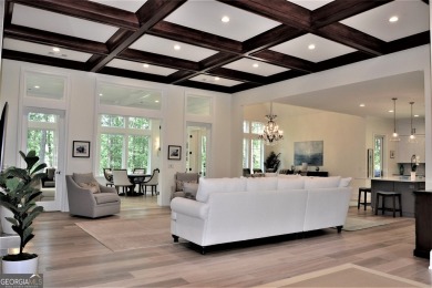 With beautiful lake views, this home is located in the sought on Reynolds Lake Oconee - The Oconee in Georgia - for sale on GolfHomes.com, golf home, golf lot