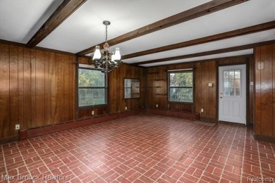 Charming tudor situated on picturesque tree lined street near on Western Golf and Country Club in Michigan - for sale on GolfHomes.com, golf home, golf lot