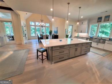 With beautiful lake views, this home is located in the sought on Reynolds Lake Oconee - The Oconee in Georgia - for sale on GolfHomes.com, golf home, golf lot