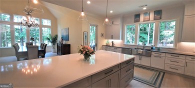 With beautiful lake views, this home is located in the sought on Reynolds Lake Oconee - The Oconee in Georgia - for sale on GolfHomes.com, golf home, golf lot