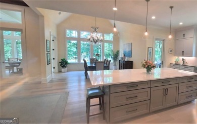 With beautiful lake views, this home is located in the sought on Reynolds Lake Oconee - The Oconee in Georgia - for sale on GolfHomes.com, golf home, golf lot