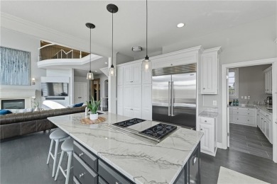 This show-stopping 1.5-story residence offers over 7,000 square on Nicklaus Golf Club At LionsGate in Kansas - for sale on GolfHomes.com, golf home, golf lot