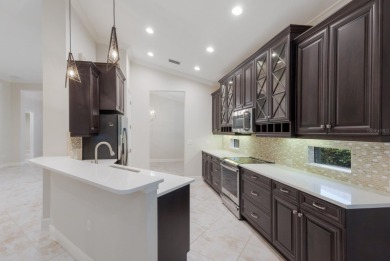 Welcome to this beautiful 3-bedroom, 2-bath residence in highly on Ritz-Carlton Members Golf Club in Florida - for sale on GolfHomes.com, golf home, golf lot