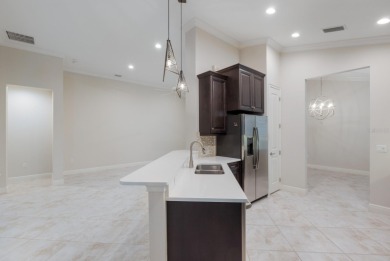 Welcome to this beautiful 3-bedroom, 2-bath residence in highly on Ritz-Carlton Members Golf Club in Florida - for sale on GolfHomes.com, golf home, golf lot