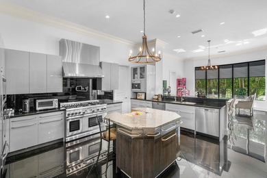 Welcome to this magnificent, National Custom Homes build in the on Boca Grove Golf and Tennis in Florida - for sale on GolfHomes.com, golf home, golf lot