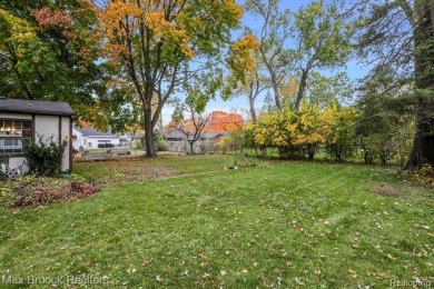 Charming tudor situated on picturesque tree lined street near on Western Golf and Country Club in Michigan - for sale on GolfHomes.com, golf home, golf lot