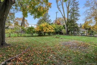 Charming tudor situated on picturesque tree lined street near on Western Golf and Country Club in Michigan - for sale on GolfHomes.com, golf home, golf lot