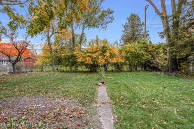 Charming tudor situated on picturesque tree lined street near on Western Golf and Country Club in Michigan - for sale on GolfHomes.com, golf home, golf lot