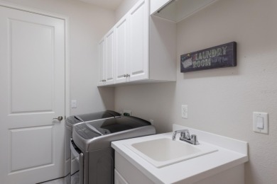 Welcome to this beautiful 3-bedroom, 2-bath residence in highly on Ritz-Carlton Members Golf Club in Florida - for sale on GolfHomes.com, golf home, golf lot