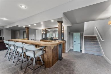 This show-stopping 1.5-story residence offers over 7,000 square on Nicklaus Golf Club At LionsGate in Kansas - for sale on GolfHomes.com, golf home, golf lot