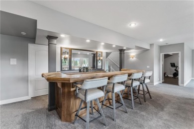 This show-stopping 1.5-story residence offers over 7,000 square on Nicklaus Golf Club At LionsGate in Kansas - for sale on GolfHomes.com, golf home, golf lot