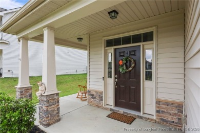 Stunning and spacious four-bedroom home with a versatile bonus on Anderson Creek Golf Club in North Carolina - for sale on GolfHomes.com, golf home, golf lot
