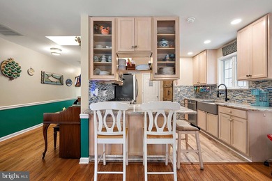 Welcome to this stunning single-level waterfront rancher in on Ocean Pines Golf and Country Club in Maryland - for sale on GolfHomes.com, golf home, golf lot