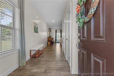 Stunning and spacious four-bedroom home with a versatile bonus on Anderson Creek Golf Club in North Carolina - for sale on GolfHomes.com, golf home, golf lot