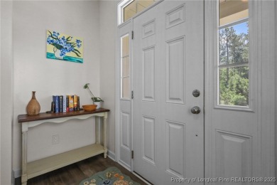 Stunning and spacious four-bedroom home with a versatile bonus on Anderson Creek Golf Club in North Carolina - for sale on GolfHomes.com, golf home, golf lot