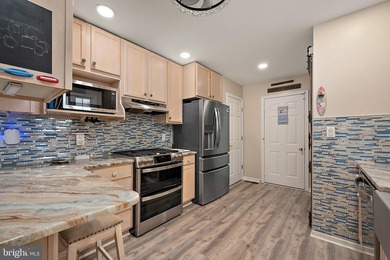 Welcome to this stunning single-level waterfront rancher in on Ocean Pines Golf and Country Club in Maryland - for sale on GolfHomes.com, golf home, golf lot