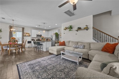 Stunning and spacious four-bedroom home with a versatile bonus on Anderson Creek Golf Club in North Carolina - for sale on GolfHomes.com, golf home, golf lot