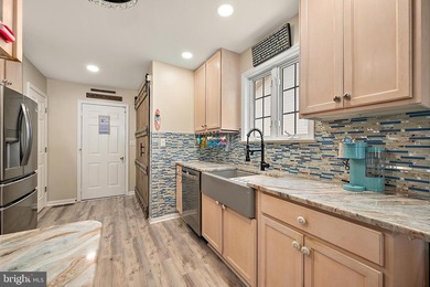 Welcome to this stunning single-level waterfront rancher in on Ocean Pines Golf and Country Club in Maryland - for sale on GolfHomes.com, golf home, golf lot