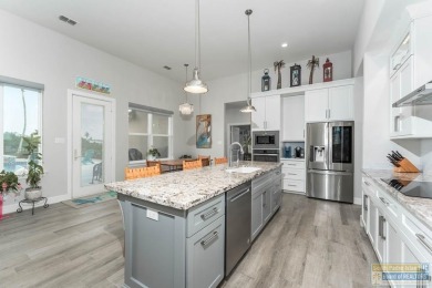 Welcome to coastal elegance in the heart of the SPI Golf on South Padre Island Golf Club in Texas - for sale on GolfHomes.com, golf home, golf lot