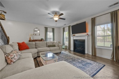 Stunning and spacious four-bedroom home with a versatile bonus on Anderson Creek Golf Club in North Carolina - for sale on GolfHomes.com, golf home, golf lot