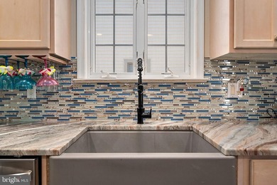 Welcome to this stunning single-level waterfront rancher in on Ocean Pines Golf and Country Club in Maryland - for sale on GolfHomes.com, golf home, golf lot