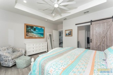 Welcome to coastal elegance in the heart of the SPI Golf on South Padre Island Golf Club in Texas - for sale on GolfHomes.com, golf home, golf lot