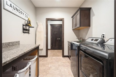 Welcome home to this beautiful ranch near Hunters Ridge Golf on Hunters Ridge Golf Course in Iowa - for sale on GolfHomes.com, golf home, golf lot