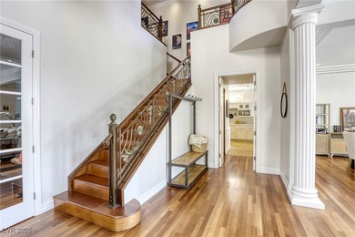 Inside exclusive gates of Canyon Gate, this elegant golf villa on Canyon Gate Country Club in Nevada - for sale on GolfHomes.com, golf home, golf lot