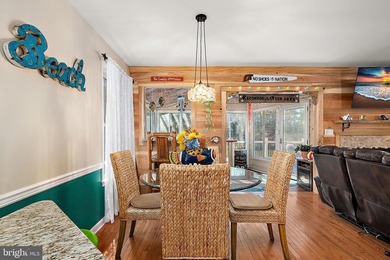 Welcome to this stunning single-level waterfront rancher in on Ocean Pines Golf and Country Club in Maryland - for sale on GolfHomes.com, golf home, golf lot