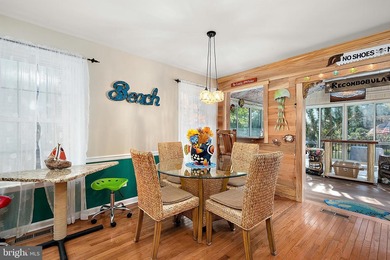 Welcome to this stunning single-level waterfront rancher in on Ocean Pines Golf and Country Club in Maryland - for sale on GolfHomes.com, golf home, golf lot