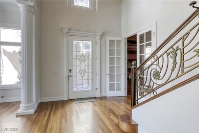 Inside exclusive gates of Canyon Gate, this elegant golf villa on Canyon Gate Country Club in Nevada - for sale on GolfHomes.com, golf home, golf lot