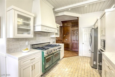 Inside exclusive gates of Canyon Gate, this elegant golf villa on Canyon Gate Country Club in Nevada - for sale on GolfHomes.com, golf home, golf lot