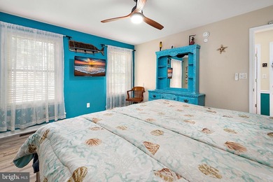 Welcome to this stunning single-level waterfront rancher in on Ocean Pines Golf and Country Club in Maryland - for sale on GolfHomes.com, golf home, golf lot